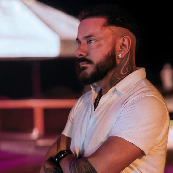 music producer adjusting sound levels on a console